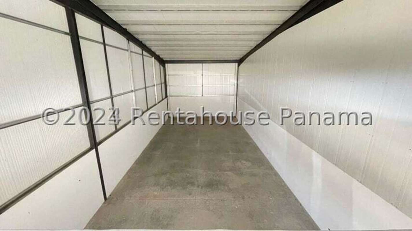 Interior view of empty warehouse with insulated ceiling and steel framing Don Bosco Panama