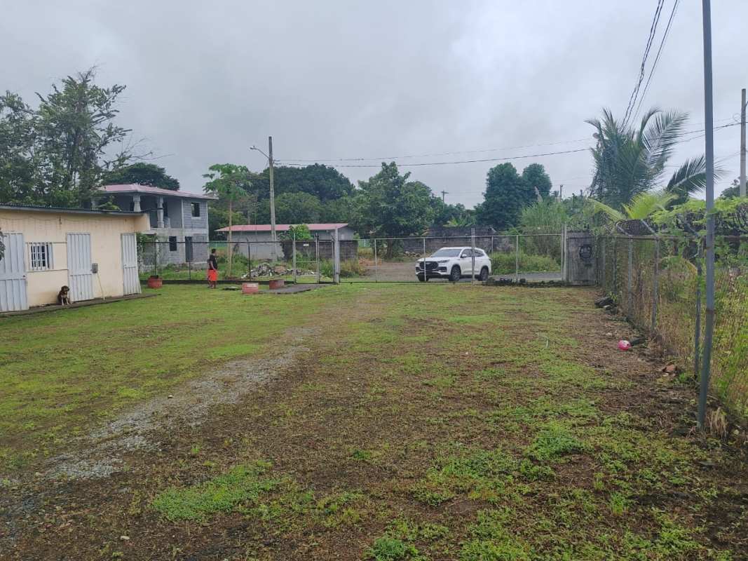 Simple bathroom with pedestal sink and shower in Pacora Panama mixed-use property for sale