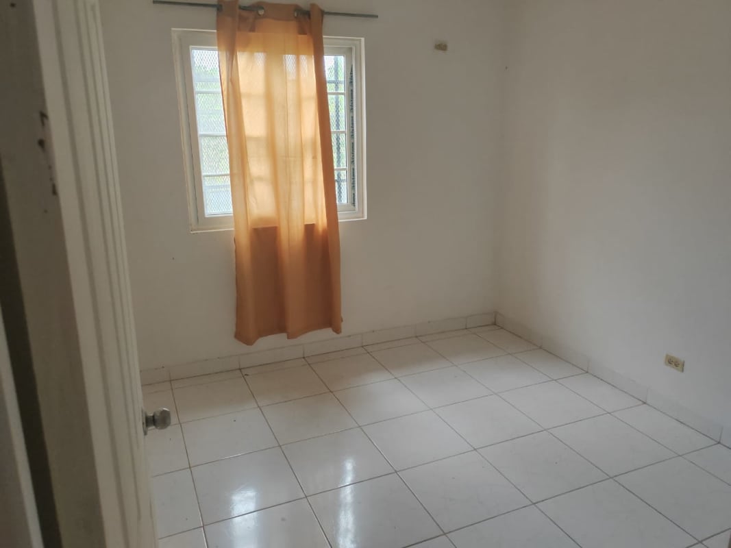 Large outdoor yard with warehouse structure on fenced property in Pacora Panama