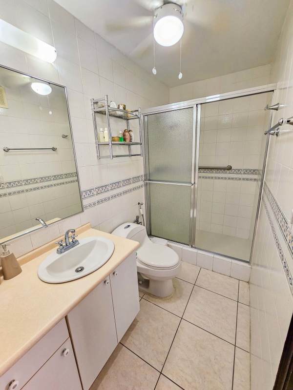 Modern bathroom ceramic tiled walk-in shower PH Riviera Pacifica Coco del Mar Panama