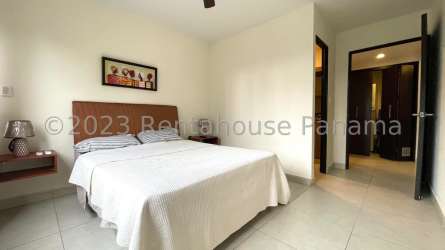 Kitchen with granite countertops and appliances in PH Midrise Panama Pacifico