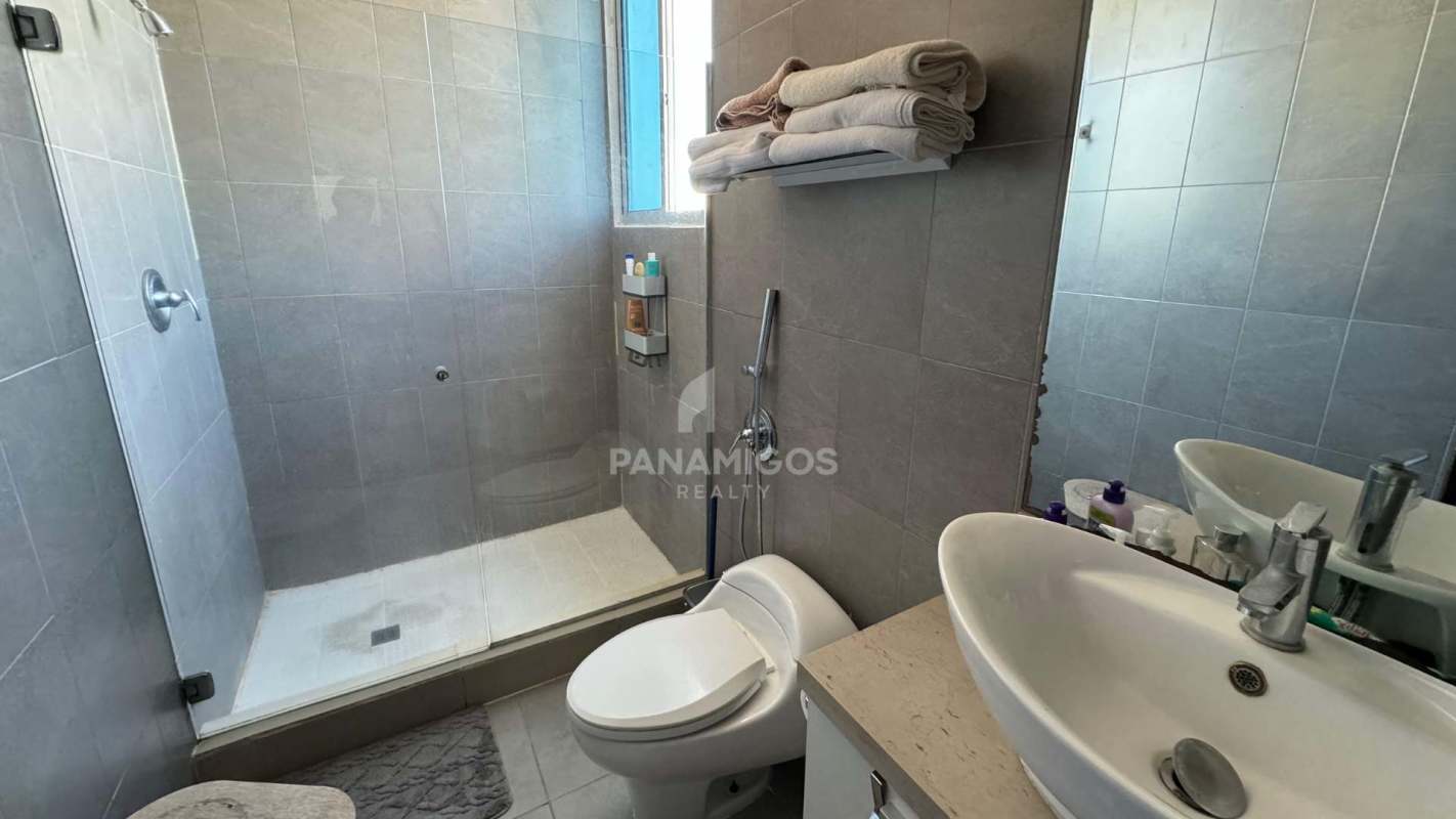 Spacious balcony with glass railings and panoramic skyline in PH Harmony Panama City