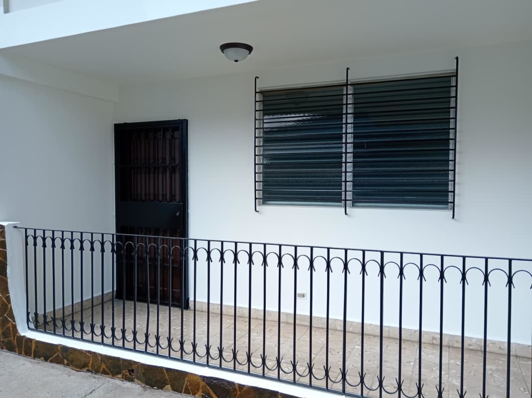 Bathroom with shower enclosure white tiles commercial residential property San Miguelito Panama