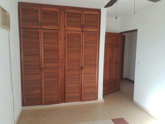 Bedroom with wood louvered closet, fan and AC space near Rio Hato Coclé