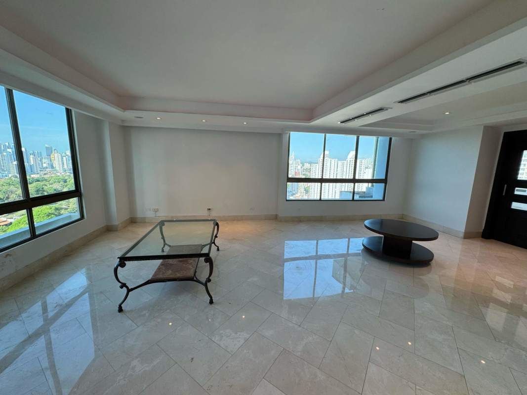 Spacious bedroom with large windows and panoramic city views in PH Golf Tower