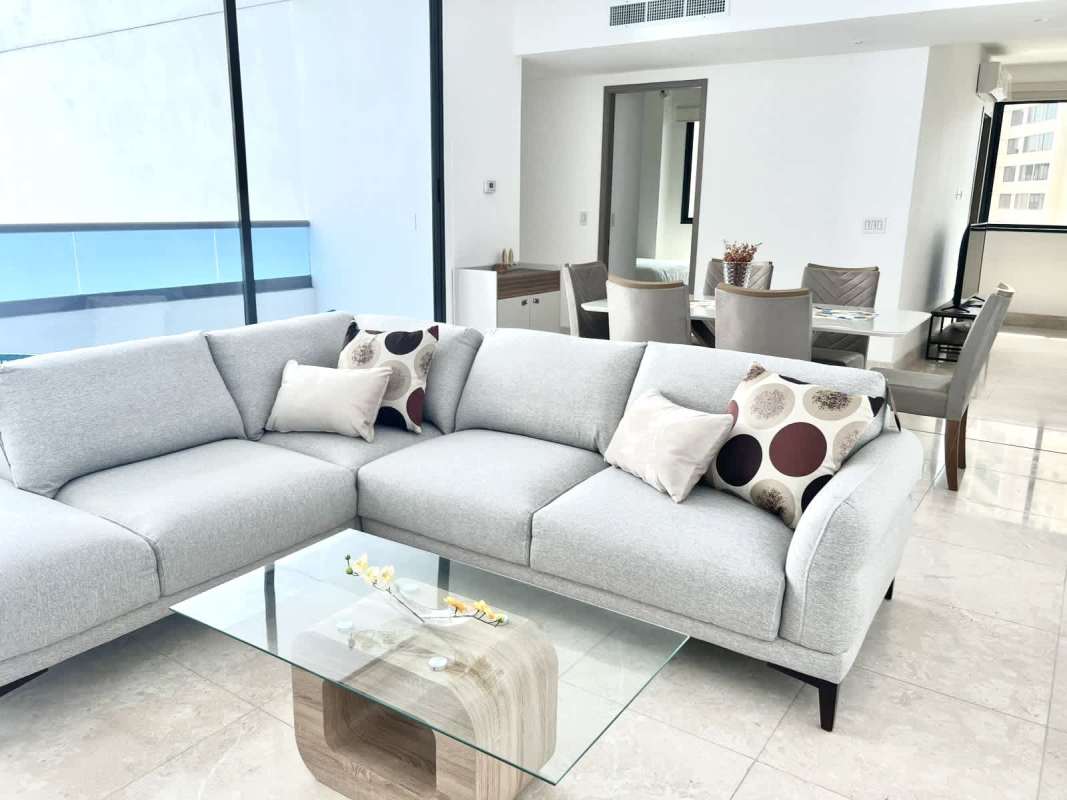 Master bedroom with floor-to-ceiling ocean view windows furnished PH The Point Punta Paitilla