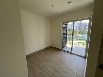 Modern beachfront complex featuring children's play area and multiple pools at Playa Caracol Punta Chame Panama