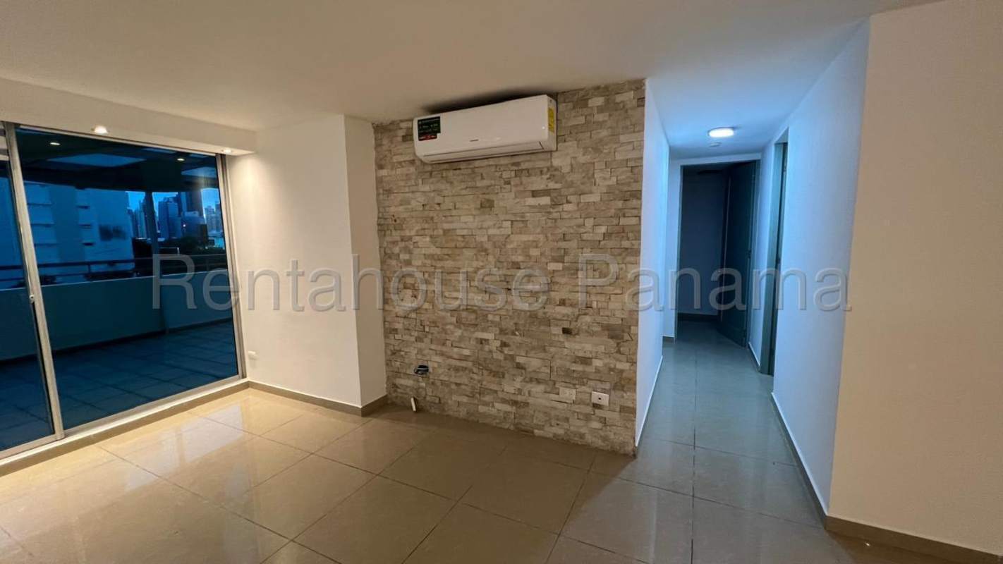 Open living dining area with sliding glass door to terrace in PH San Francisco Tower Panama City