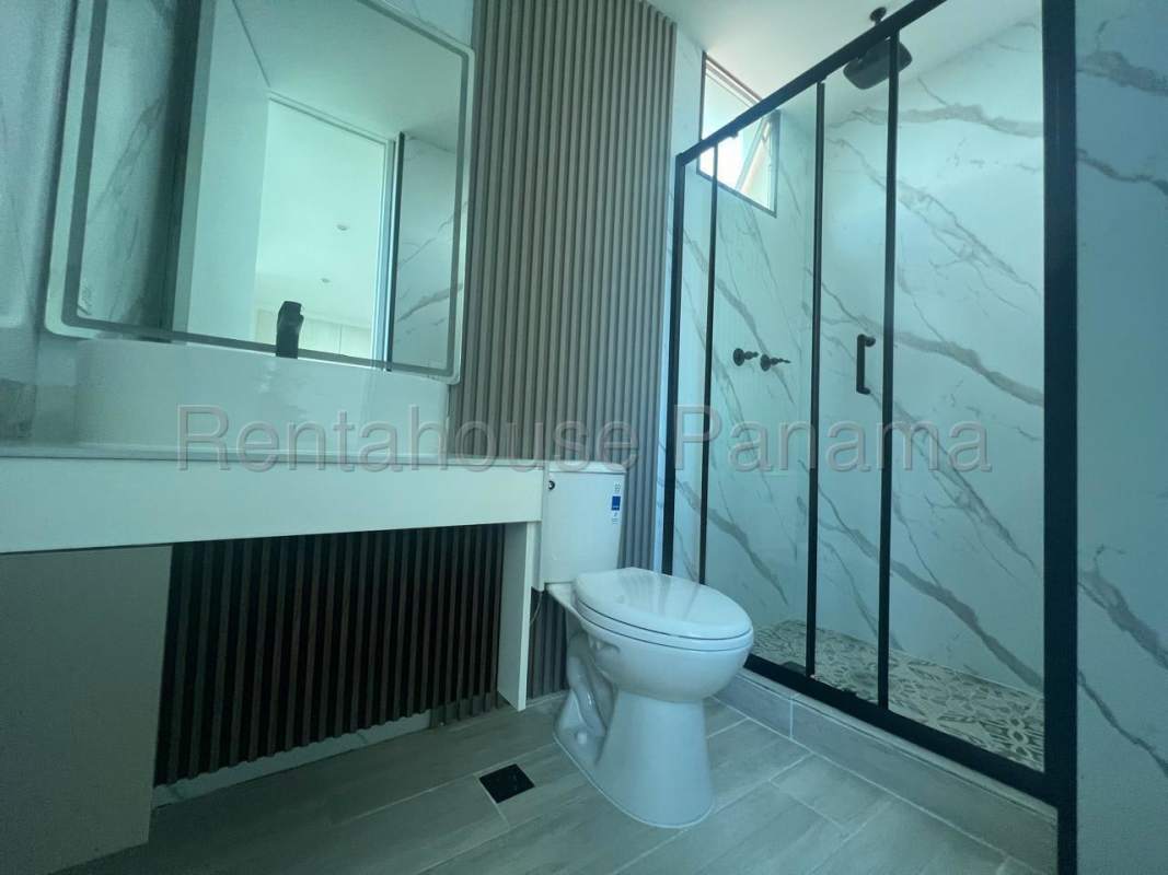 Master bedroom featuring walk-in closet, balcony access and split AC in PH Titanium Panama