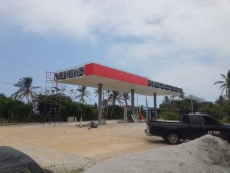 Interior of new convenience store with refrigerators in gas station Costa Abajo Panama