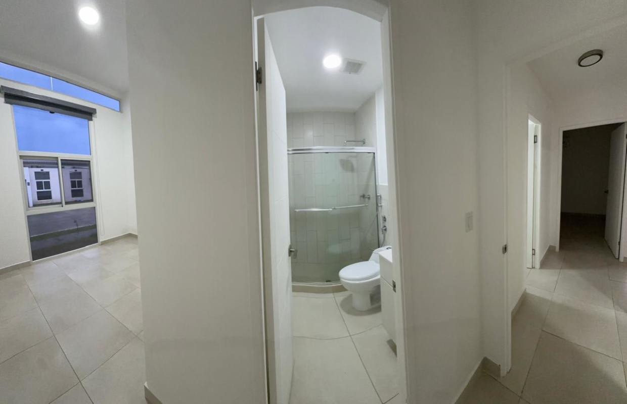 Modern bathroom with glass enclosed shower vanity and tile Villasur Residences Costa Sur Panama City