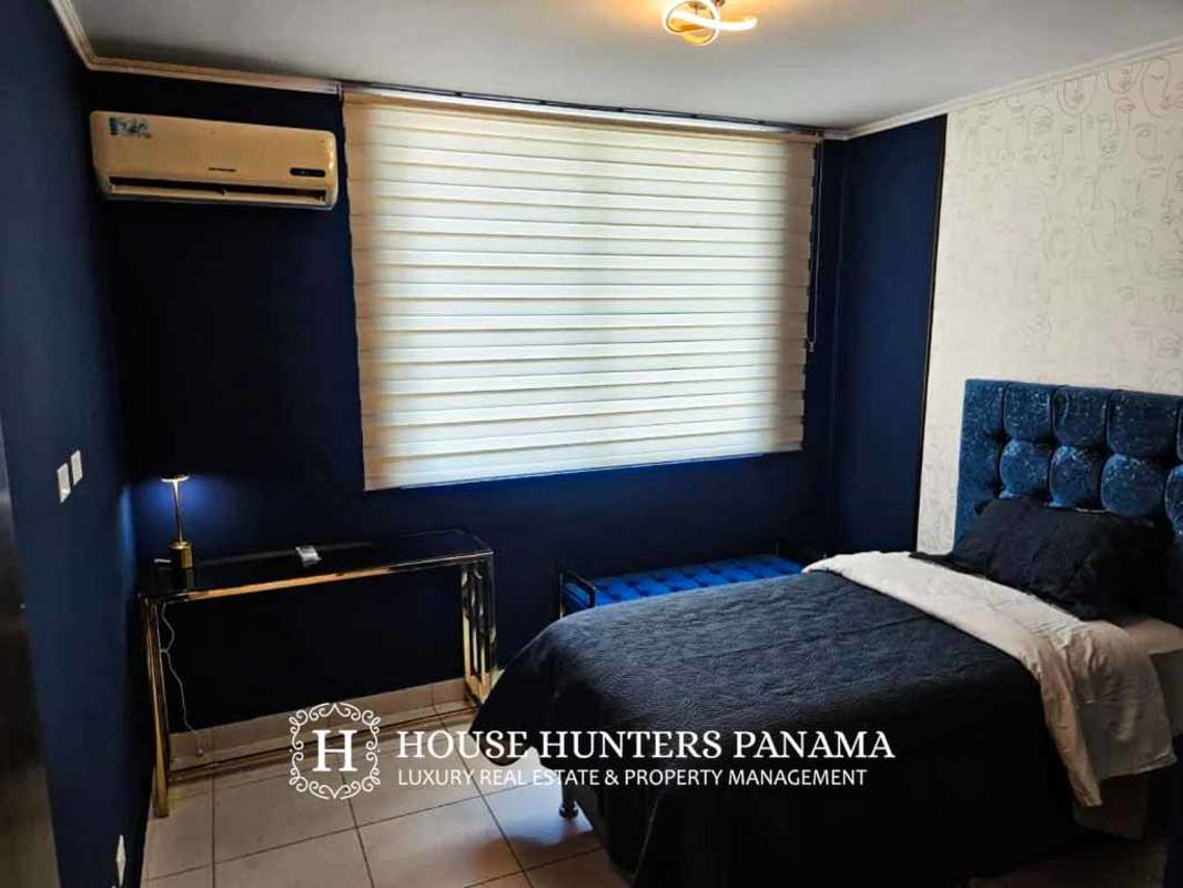 Modern bathroom with sleek tiles, vanity and fixtures in PH Miró El Cangrejo Panama City