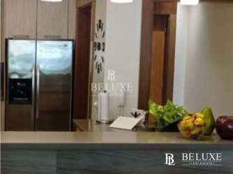 Kitchen with granite counters and appliances in PH Balboa II Bijao Panama