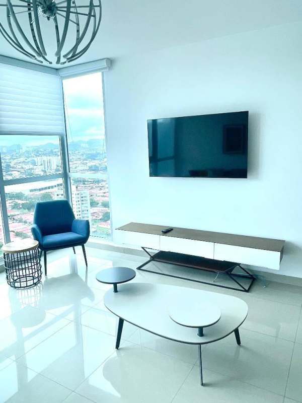 Modern furnished kitchen with granite countertops and full appliances in PH Top Towers Panama City
