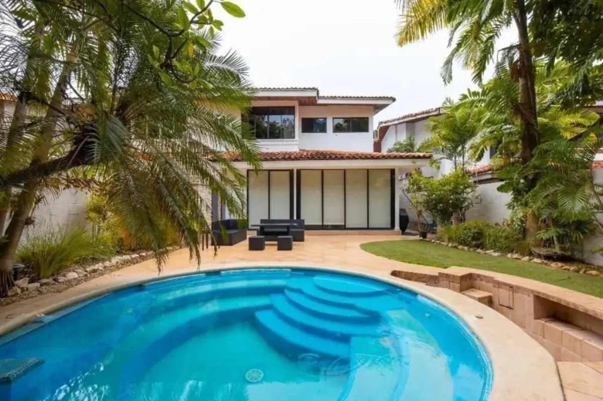 Mediterranean backyard with swimming pool, jacuzzi, patio seating area in Obarrio Panama