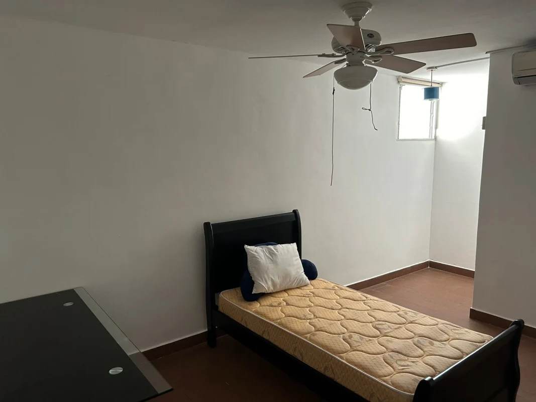Bedroom with air conditioning, closet space and ceiling fan in PH Mediterráneo El Cangrejo Panama City
