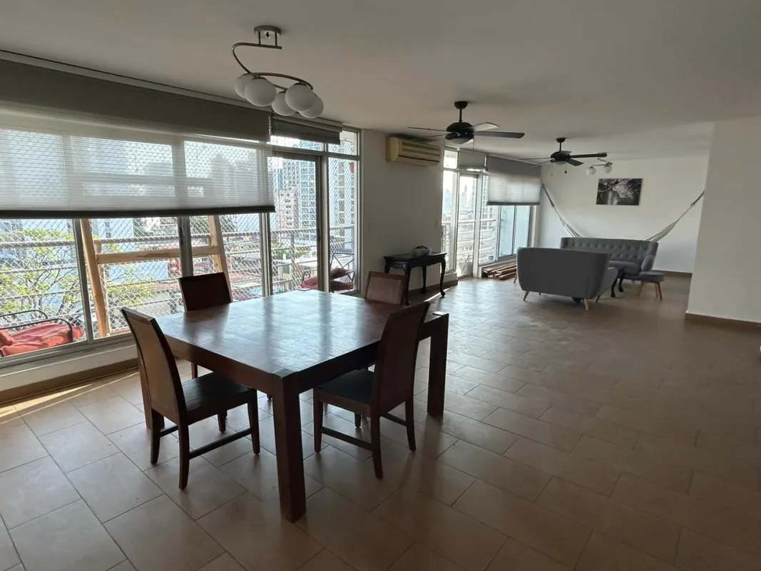 Modern kitchen with granite countertops, breakfast bar, stainless appliances in PH Mediterráneo Panama