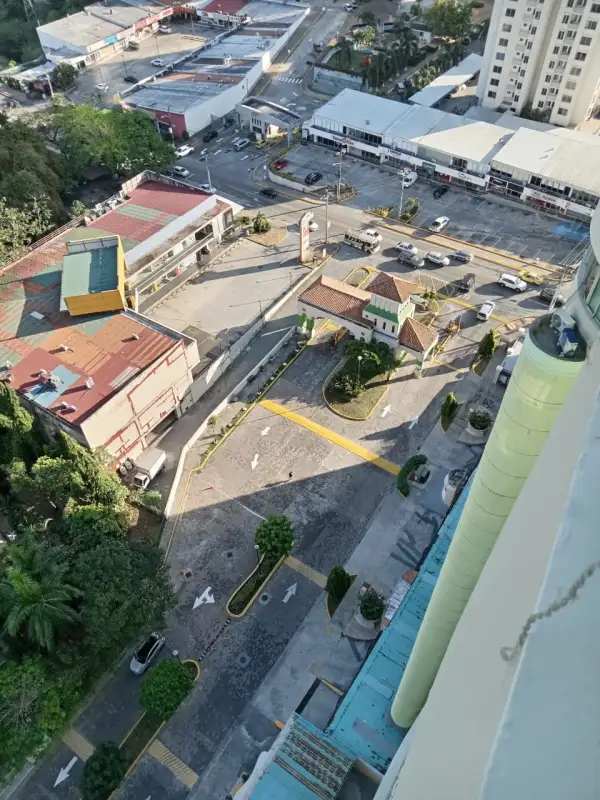 Aerial view of commercial complex, parking lot near PH Condado Country Club Panama City