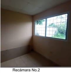Second bedroom with secure windows and tile floor in Las Lomas David Chiriquí Panama