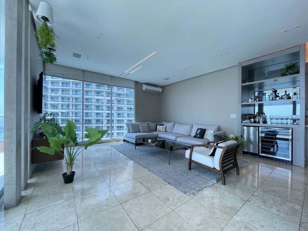 Modern furnished living dining room with bay views in PH Sky Residences Avenida Balboa Panama