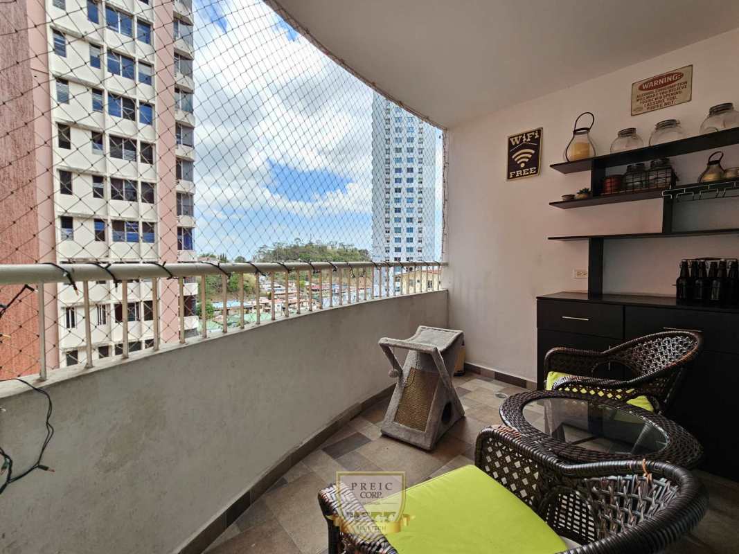 Private balcony city views safety mesh seating area in PH Royal Hill Villa de las Fuentes Panama