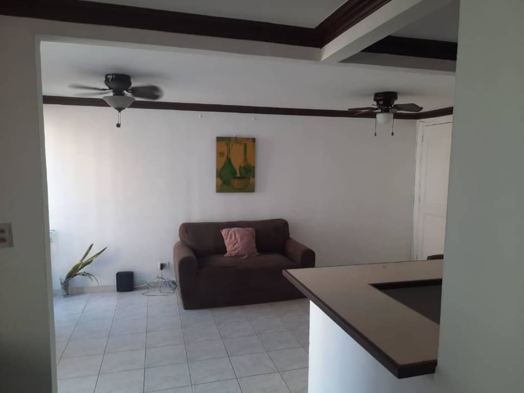 Laundry space with machine, utility sink and window in PH Residencial Río Abajo Panama