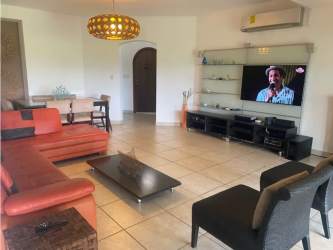 Spacious living room open plan with golf views in Vista Mar villa Panama for sale