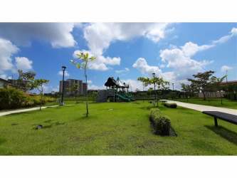 Fully equipped kitchen with granite counters and modern appliances in PH Midrise Panama Pacifico