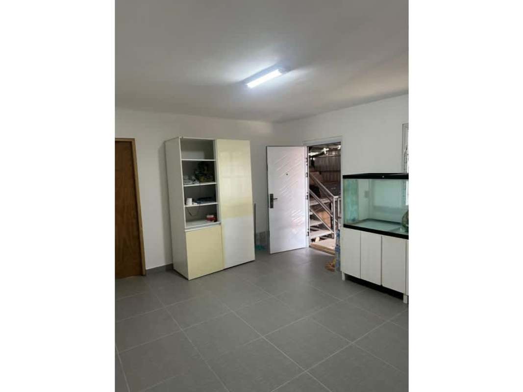 Entry office area within warehouse space minimalist style tiled floor at Llano Bonito Panama