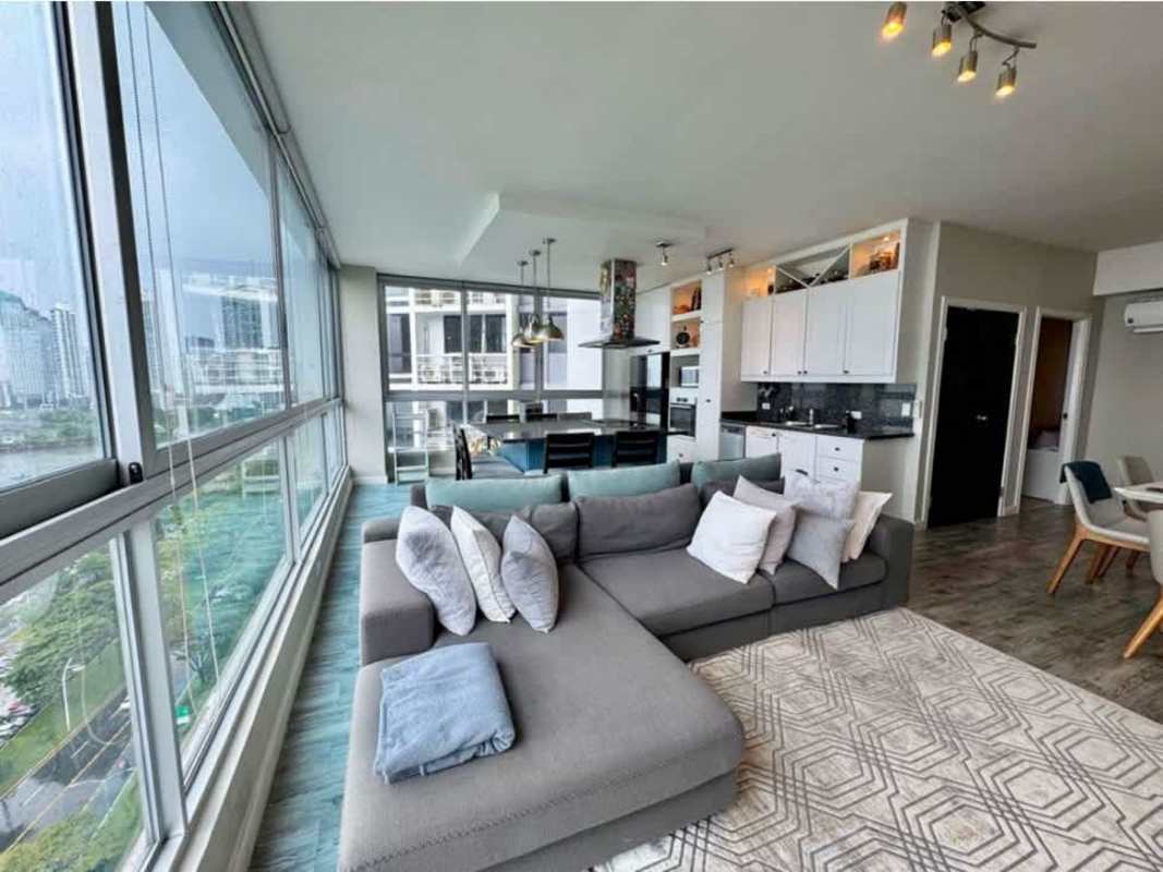 Spacious master bedroom with full height glass and ocean views at PH BICSA Tower Panama