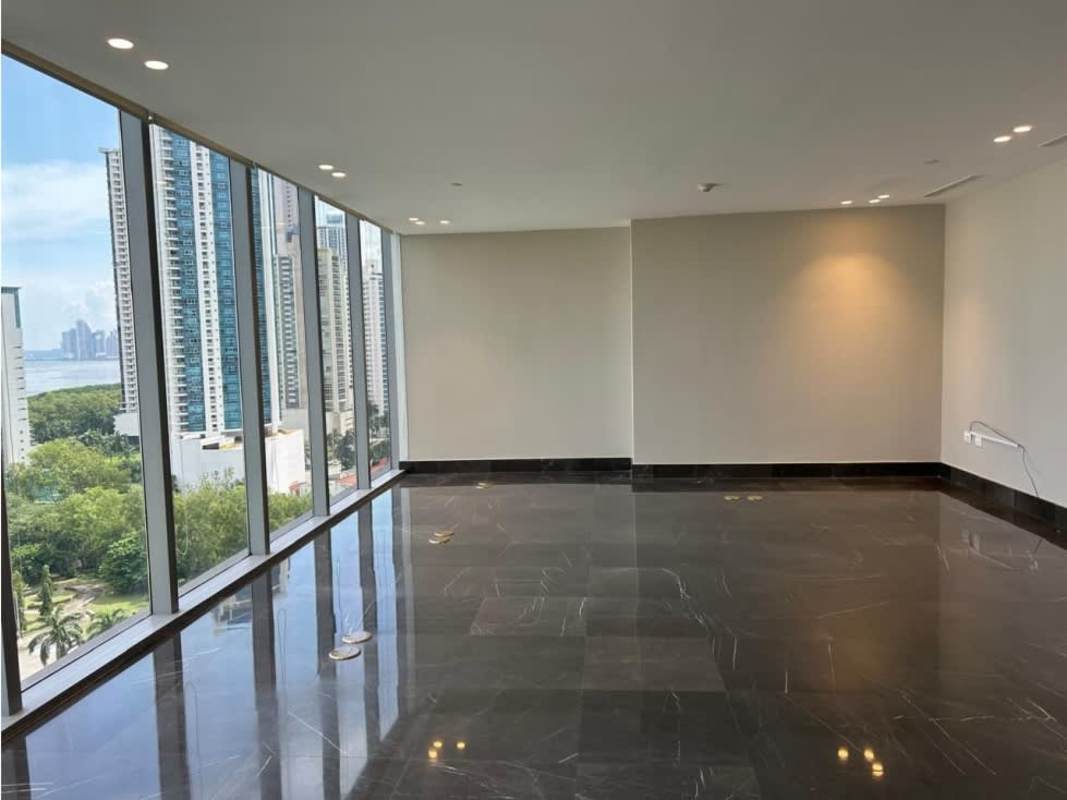 Modern office layout with marble flooring and floor-to-ceiling windows in PH Panama Design Center