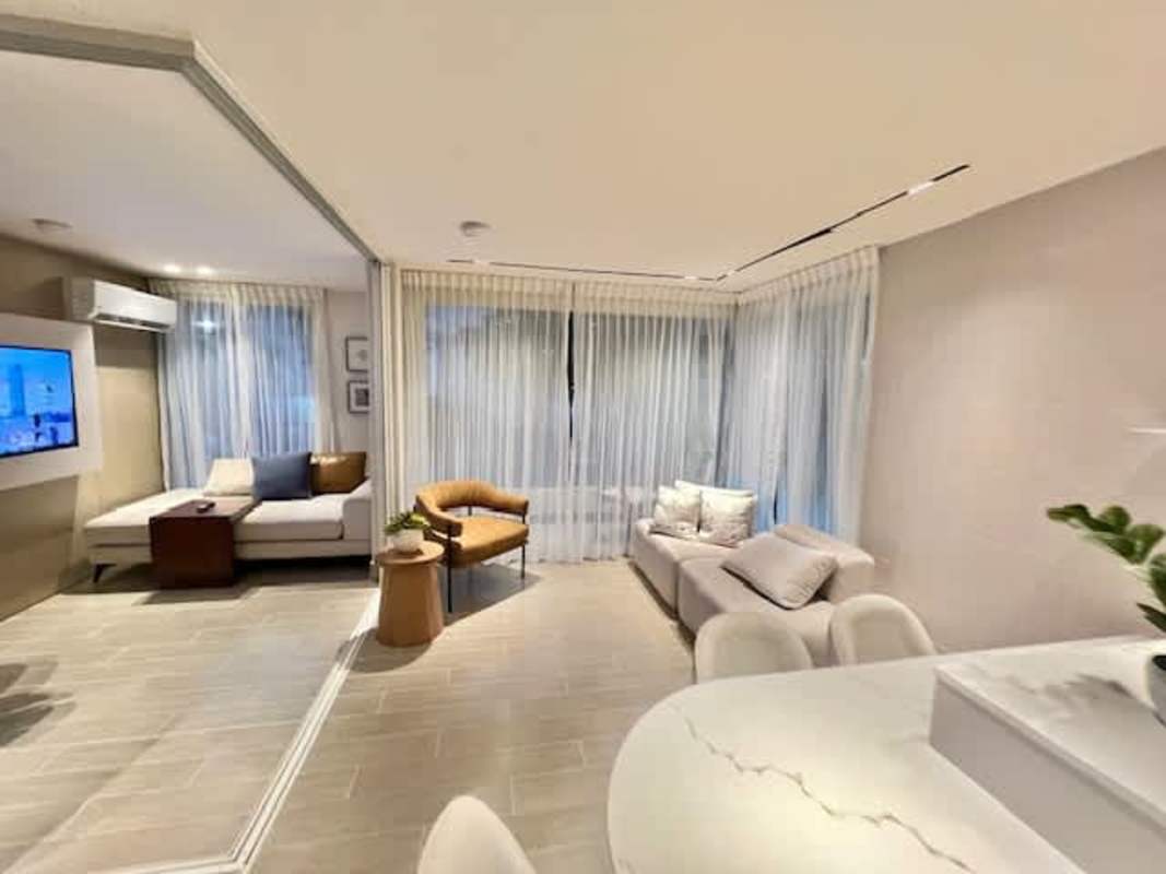 Bright bedroom space with window and skyline view PH Armonía Bella Vista