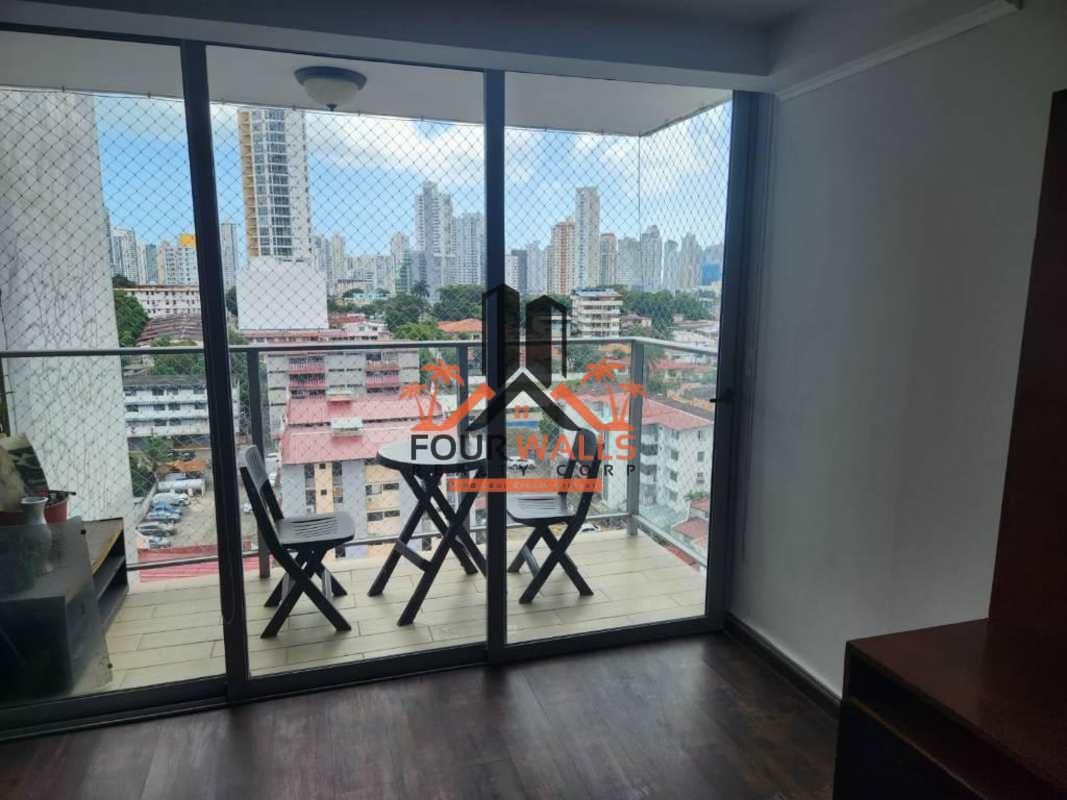 Bedroom with closet and large window overlooking Panama City in PH Torres de Castilla San Francisco
