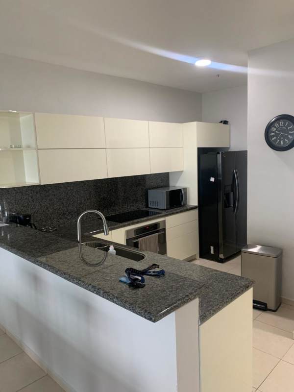 Modern bathroom with marble countertop and walk-in glass shower Avenida Balboa Panama