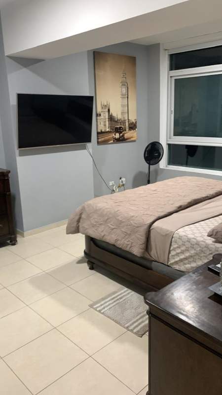 Bedroom with large window and Pacific ocean views PH BICSA Financial Panama