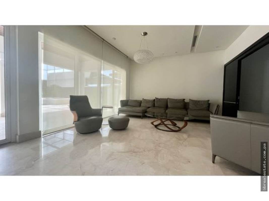 Spacious closed kitchen with granite countertops and appliances in luxury Costa del Este house