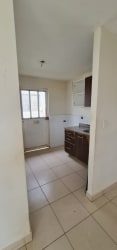 Kitchen with tile floors, natural light and built-in cabinetry in corner house for sale in La Chorrera