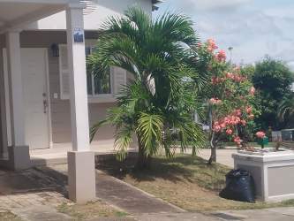 House entrance with landscaped garden corner plot La Chorrera