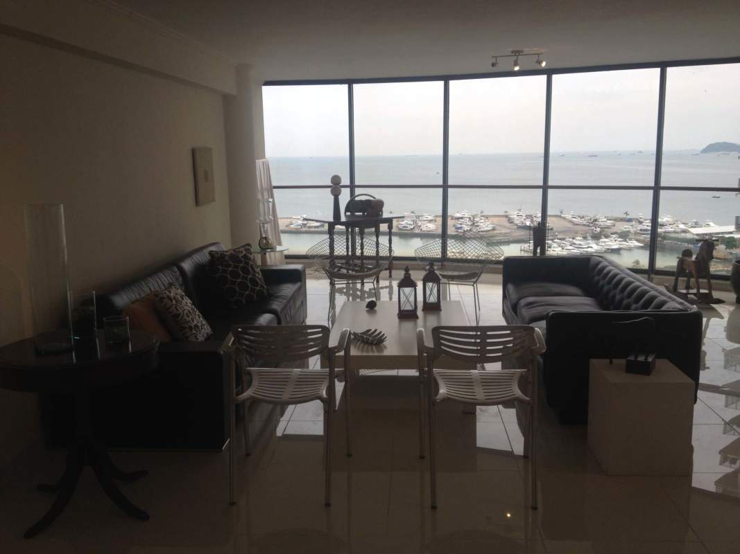Modern bathroom with glass shower, mosaic tile accent and large mirror PH Vista del Mar Panama