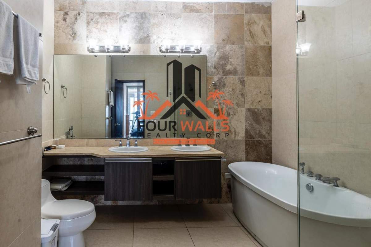 Kitchen with granite countertops, stainless appliances, upscale finish at PH Rivage Panama