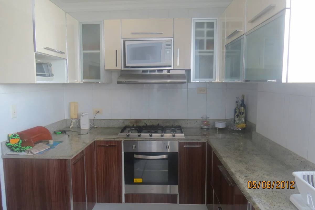 Modern dining room with vertical blinds glass table split AC villa de las fuentes Panama