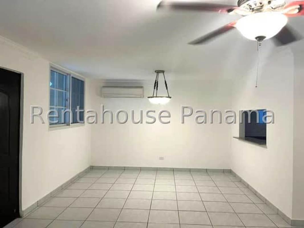 Bright open-plan living dining with ceiling fan tile floor and split AC Panama Panama City