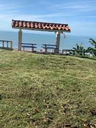 Oceanfront pergola and picnic benches overlooking Pacific Ocean Coronado Beach Panama