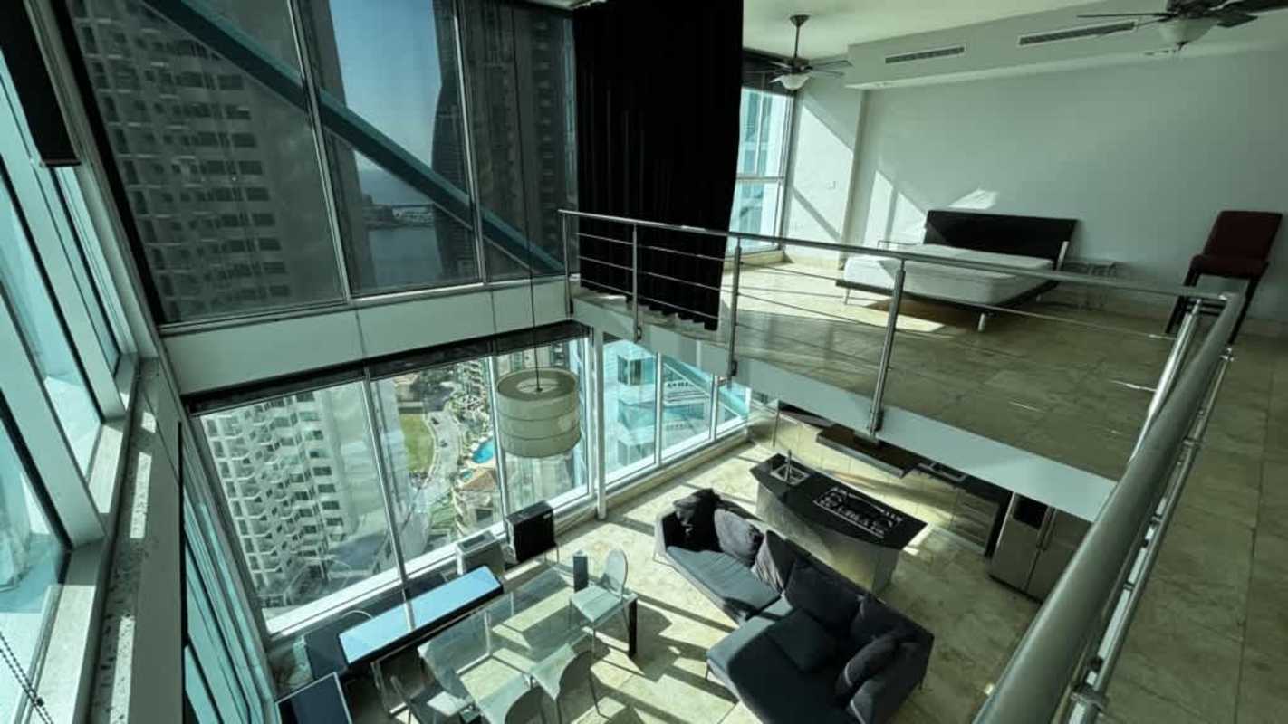 Stainless steel modern kitchen with island in PH Loft Four41 Punta Pacifica apartment for sale