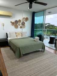 Equipped open kitchen in oceanfront studio PH Bala Beach Resort Colón Panama