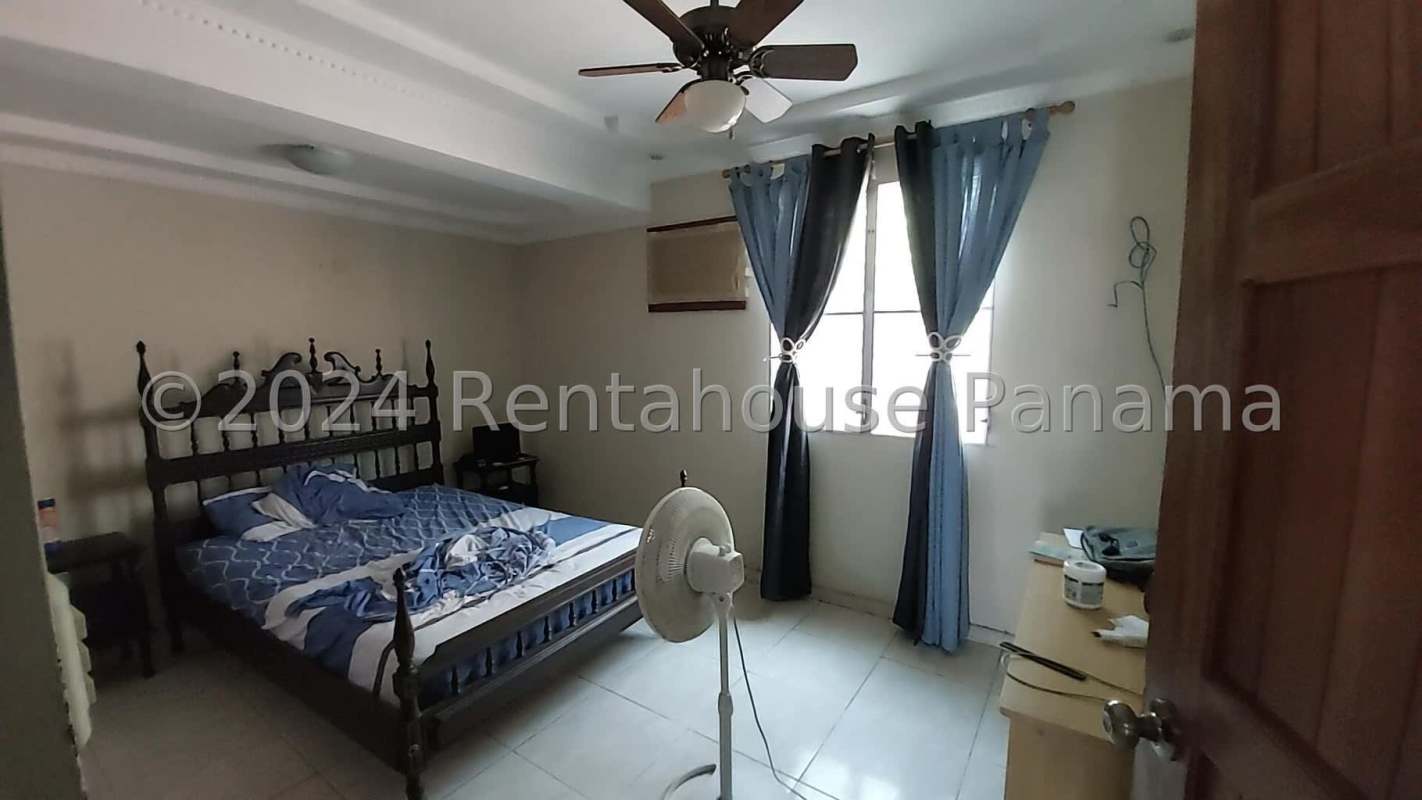 Main bedroom with AC, ceiling fan, large window in Tierra Alta Villa Lucre Panama