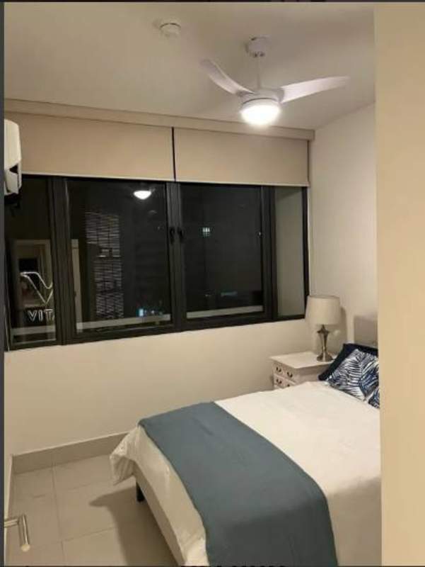 Second bedroom at PH Coco del Mar with built-in closet city view Panama City