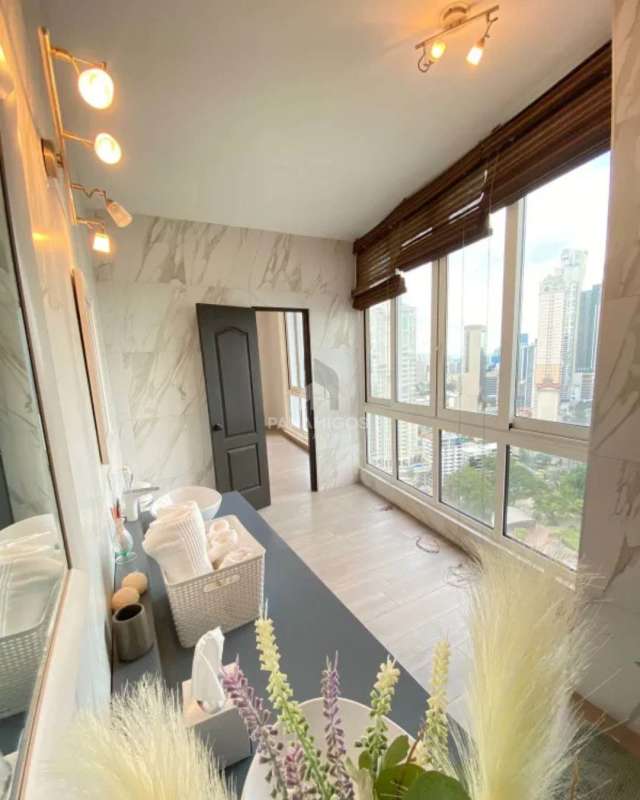 Second bedroom with en-suite bath and ocean skyline views in PH Marina Park Bella Vista Panama