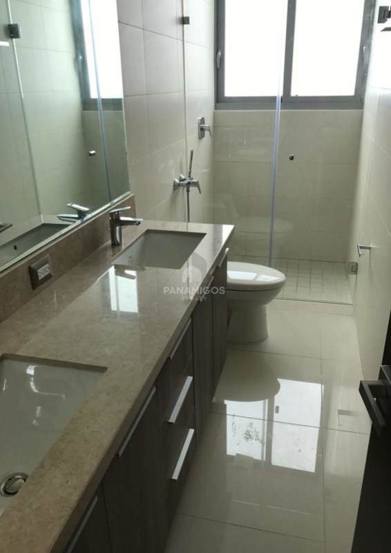 Modern bathroom with glass shower, marble top vanity, designer tile in PH Bali Panama