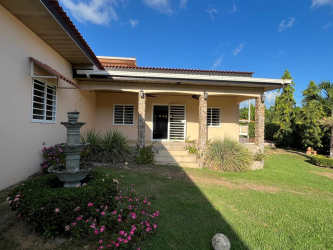 Private swimming pool with jacuzzi, pergola, and landscaped backyard at country home Las Uvas Panama